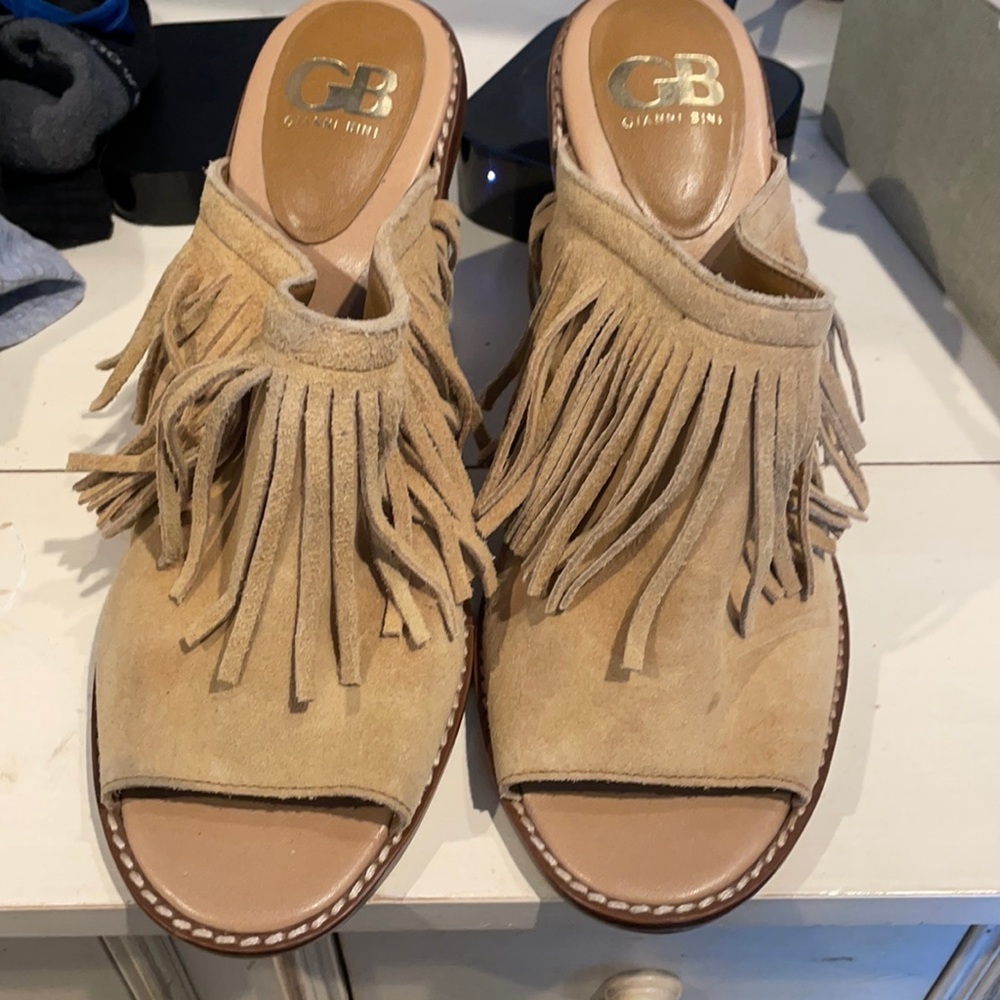 Peep toe fringe mules